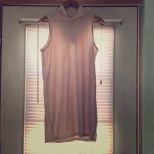 Light pink sleeveless sweater with hood.